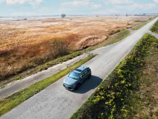 ev-driving-down-road