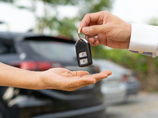 someone-handing-car-keys